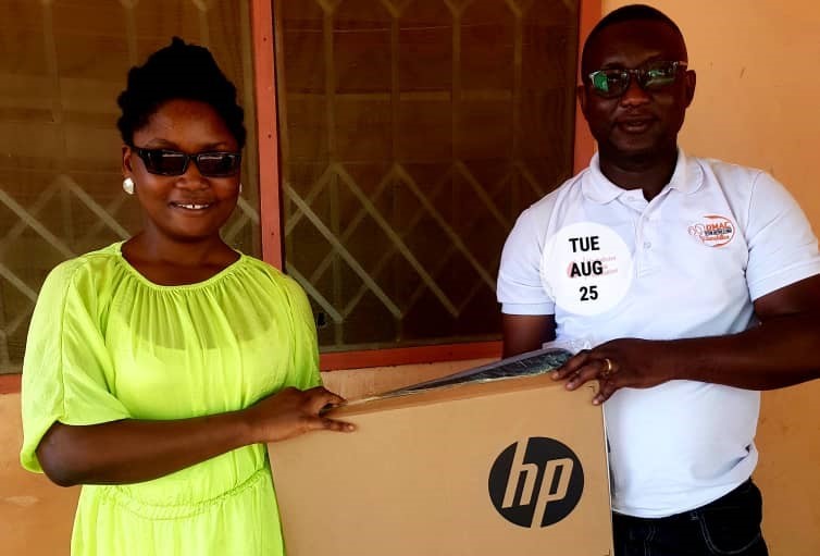 DMAC and Joy Industries Donate Laptop to Blind Student at UCC