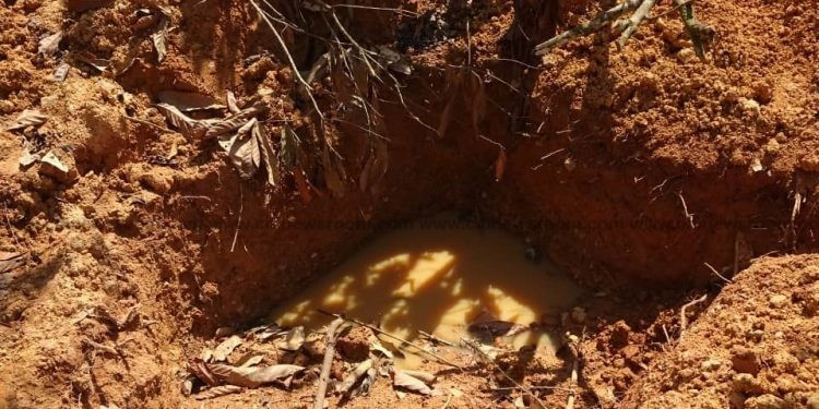 Man Killed, Body Parts Removed Dumbed In Pit Filled With Water in Gomoa