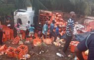 Asaman Tamfoe Residents Party with Accident Truck Loaded With Alcoholic Beverages