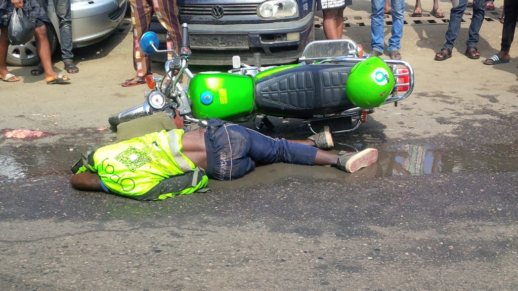 Koforidua: Tricycle Rider Crushed To Death after Jumping Traffic Light