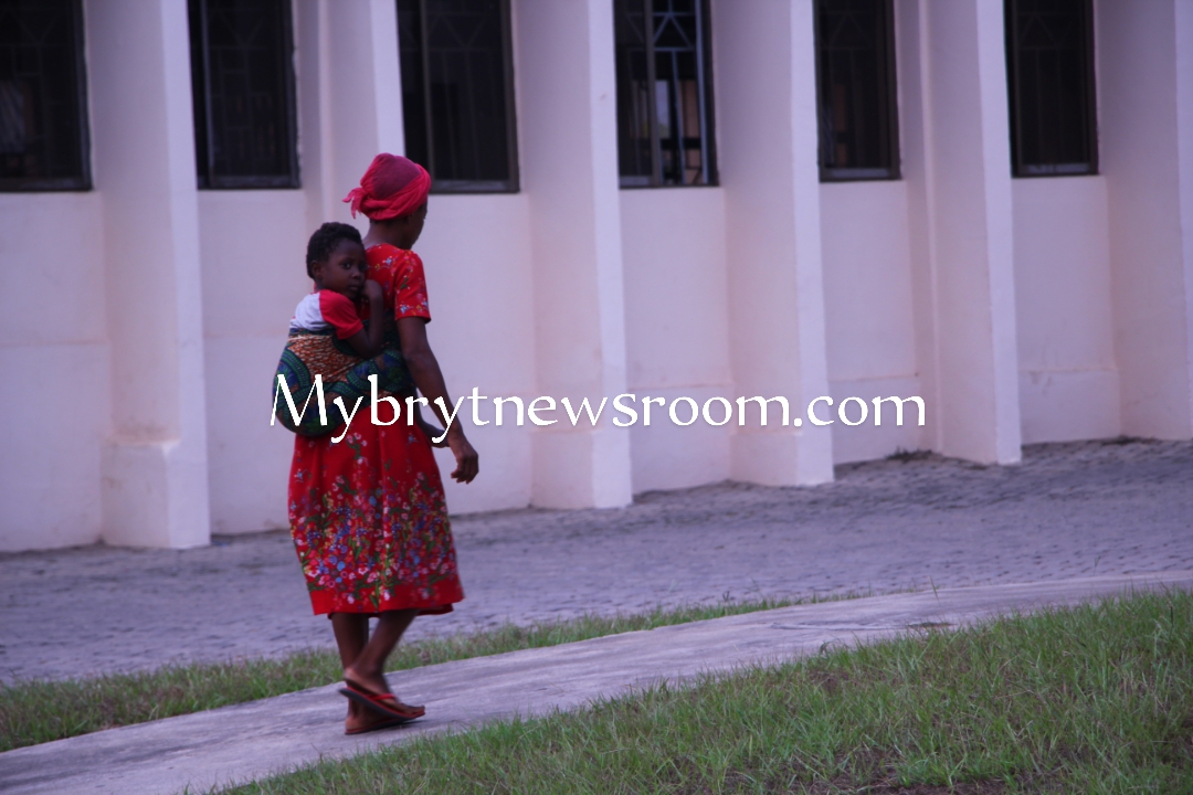 Mentally Unstable Woman Endangers Life of Child on Streets of Koforidua