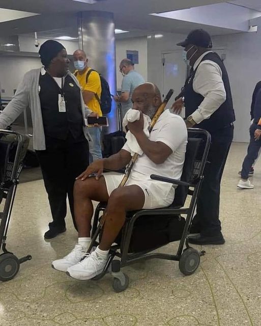 Boxing Legend Mike Tyson In A Wheelchair With Sciatica Flare-Up Defect