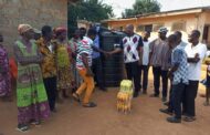 Asuogyaman MP Visits Remote Villages with 40 Horsepower Outboard Motor and Polytanks