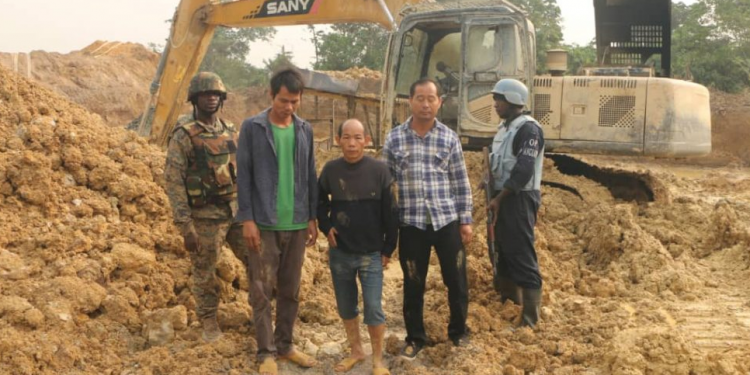 W/R: Galamsey Cartel under Siege 3 More Chinese, 6 Ghanaians, 3 Excavators, Weapons Retrieved By Police