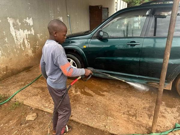 12-Year Old Boy Opts To Wash Cars To Support Mother Than Attending School